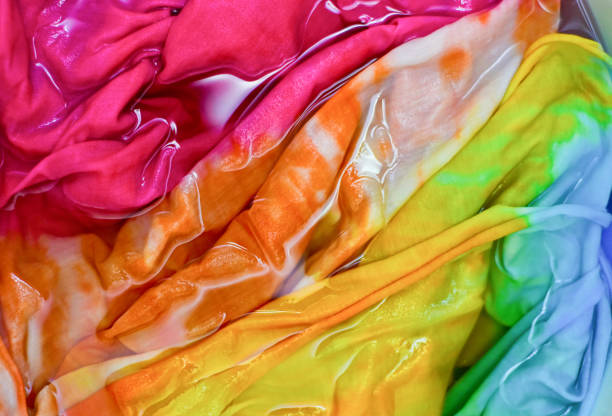 wet colorful tie died fabric in water